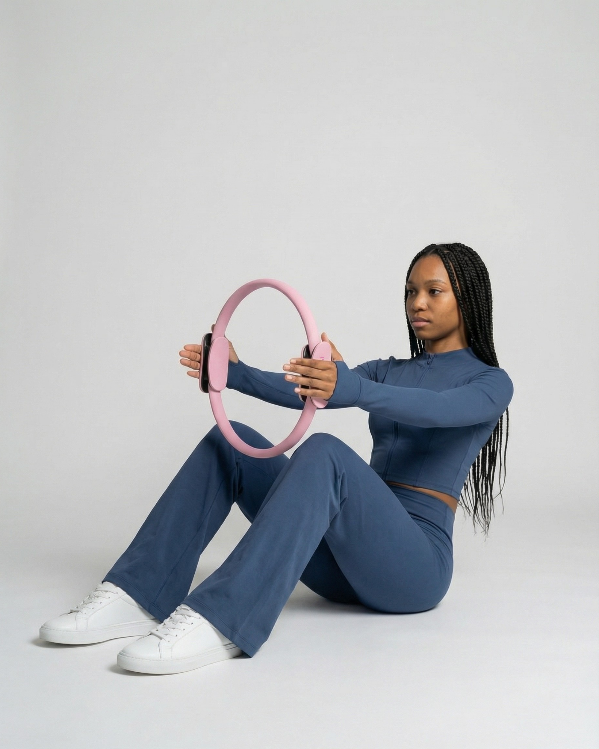 #color-Rose Exercice de renforcement  avec le ring Pilates rose.